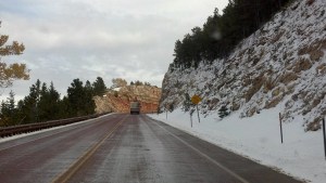 Sign: Watch for falling rocks. As if there wasn't enough to worry about.